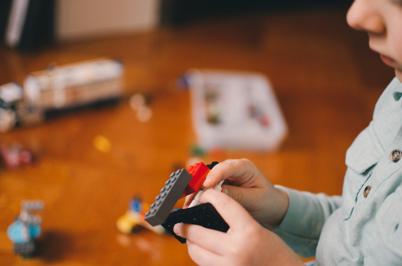 Toddler playing with building blocks