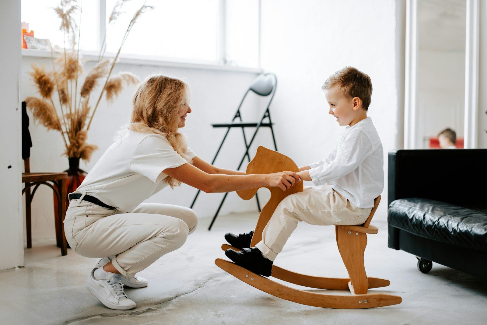 Therapist and young child playing together